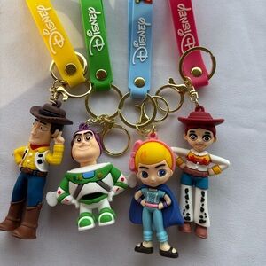 Disney Toy Story Keychain Set - Yellow, Blue, Pink